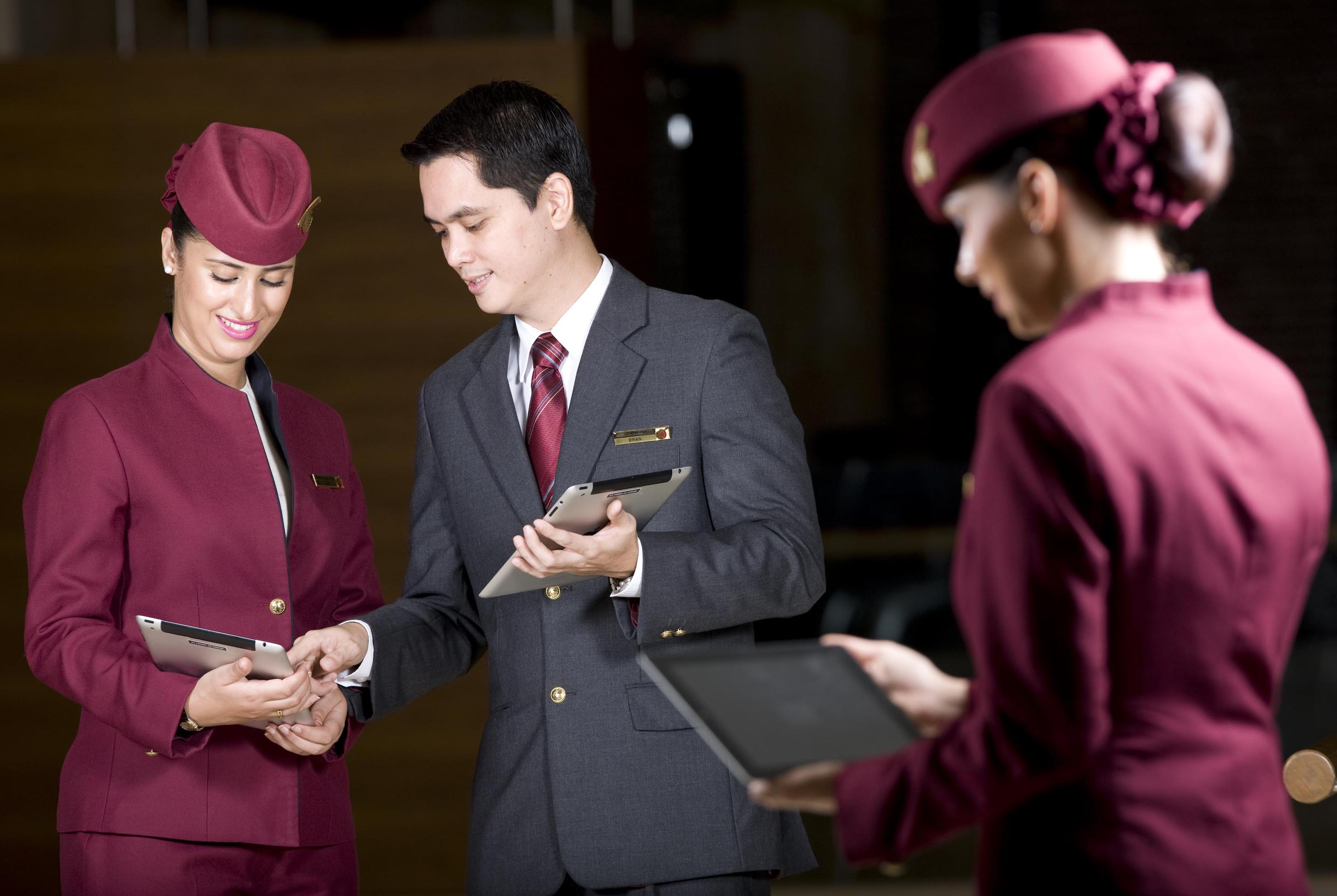 concierge_staff_at_doha_international_airport_using_the_custom-built_ipad__exclusively_for_qatar_airways_passengers.jpg Image preview