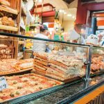 MSC Meraviglia cruise, old town of Genoa. bakery with pizzas