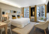 One of the junior suites at the Hotel Camille Paris Gare de Lyon (Tapestry Collection by Hilton).
