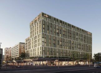 La marque InterCity propose un nouvel hôtel d'affaires à Genève à proximité de l'aéroport dans le quartier de l'Etang, un ancien site industriel repensé.