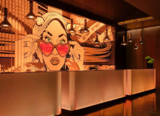 L'artiste urbain londonien D*Face, signature au design de l'art'otel Londres Hoxton.