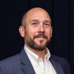 Damien Palausi, Director of Solution Consulting at SAP Concur.