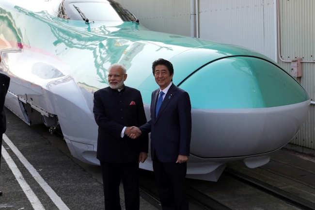 In 2016, Indian Prime Minister Narendra Modi and his Japanese counterpart, the now-deceased Shinzo Abe, visited a Shinkansen manufacturing plant in Kobe. In 2016, Indian Prime Minister Narendra Modi and his Japanese counterpart, the now-deceased Shinzo Abe, visited a Shinkansen manufacturing plant in Kobe.